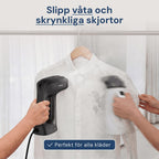 Sort Rennoa QuickSteamer damper en hvid skjorte på bøjle – Slip for våde og krøllede skjorter